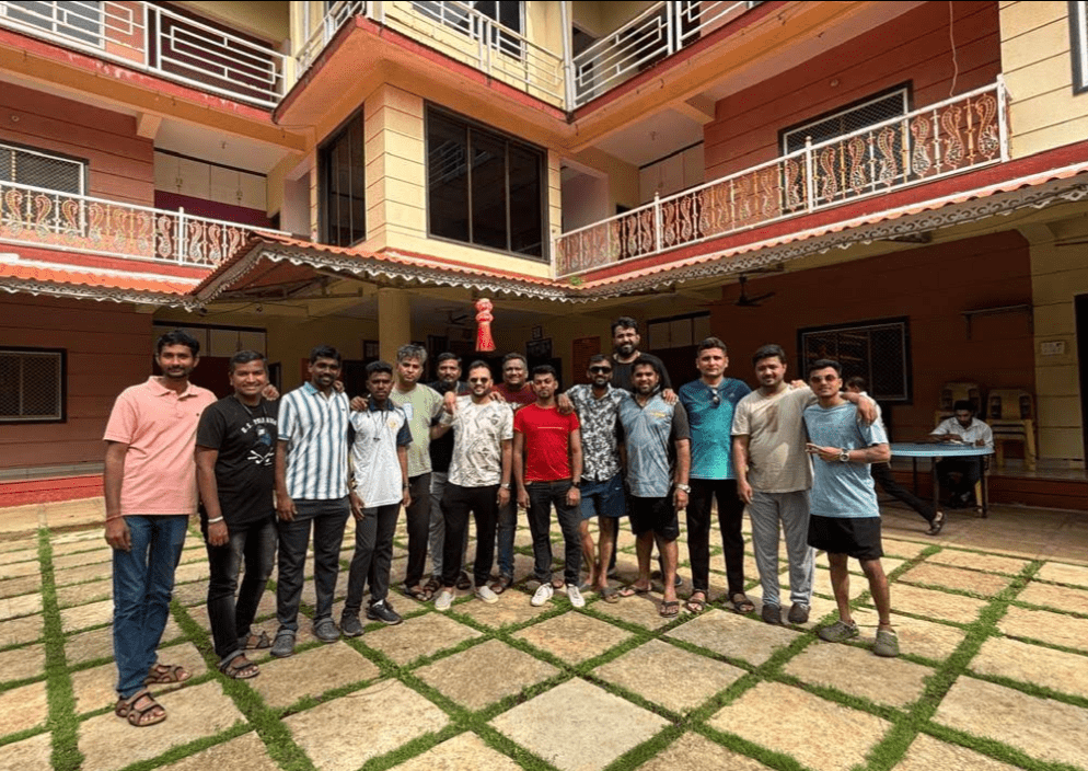 People at Kashid with back side hotel